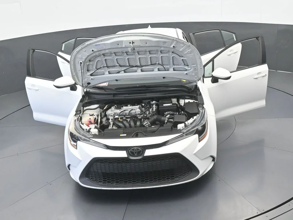 Used 2021 Super White Toyota LE image 60
