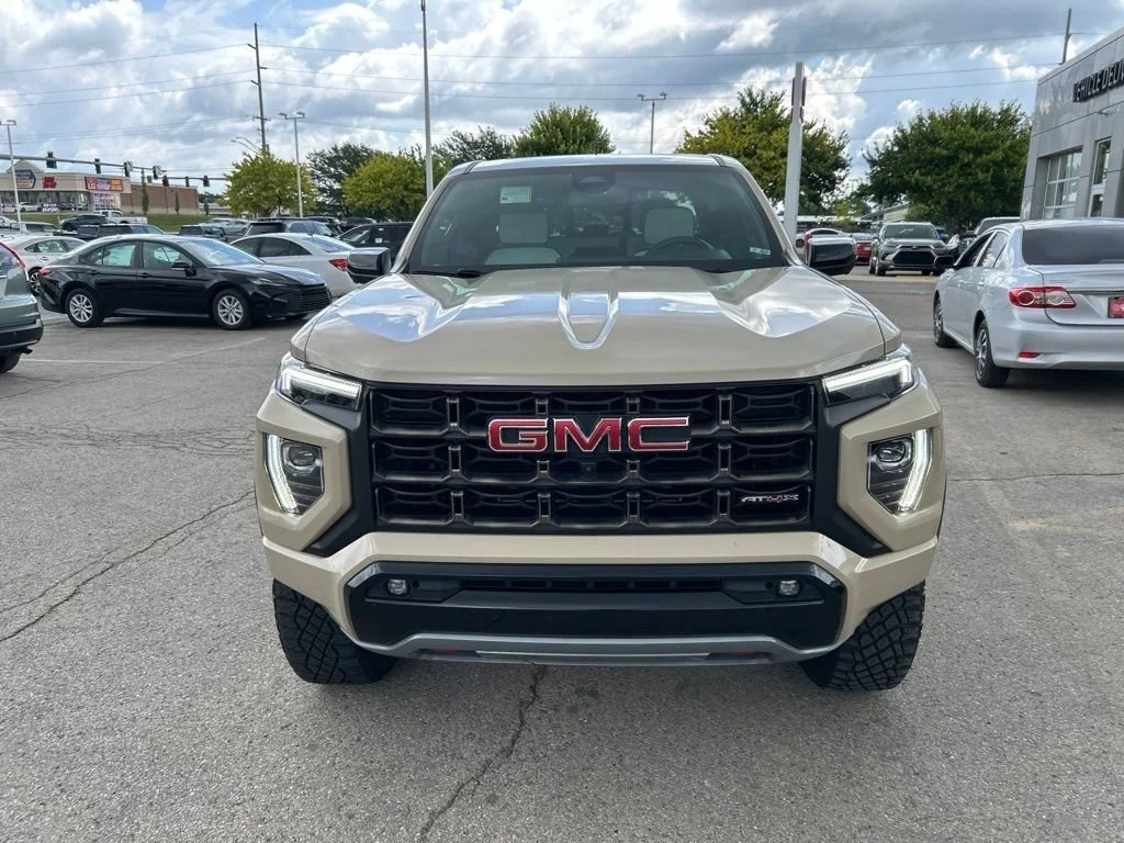 Used 2023 Desert Sand Metallic GMC AT4X image 2