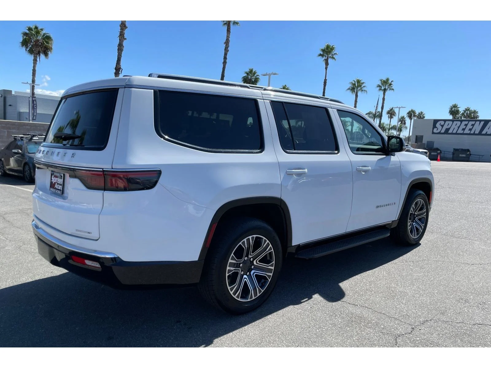 Used 2024 Bright White Clearcoat Jeep Series II image 5