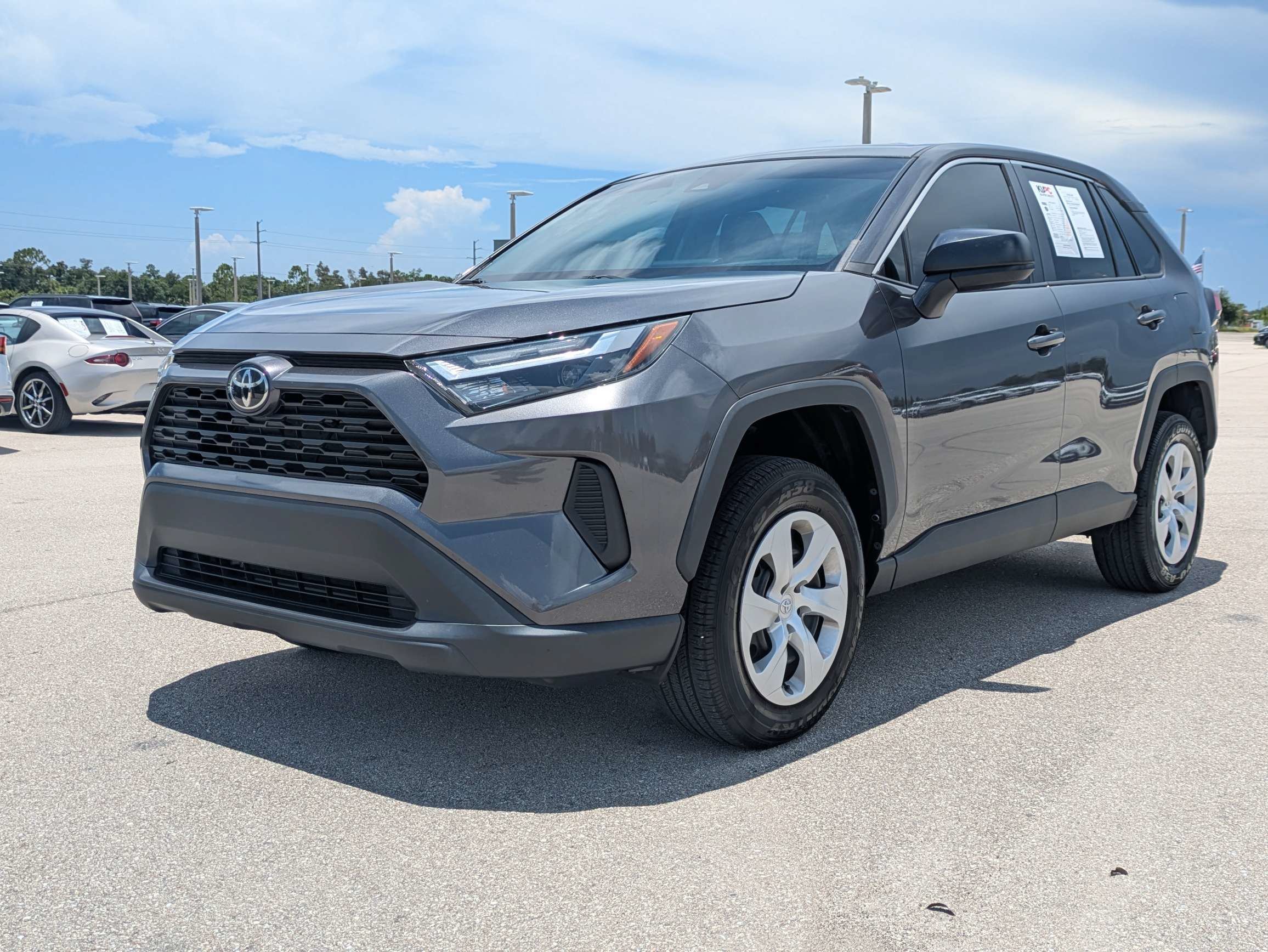 Used 2024 Magnetic Gray Metallic Toyota LE image 8