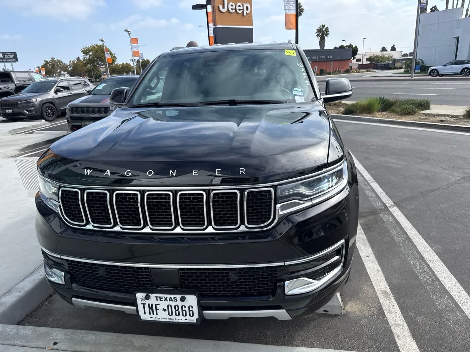 Used 2024 Diamond Black Crystal Pearlcoat Jeep Series II image 3
