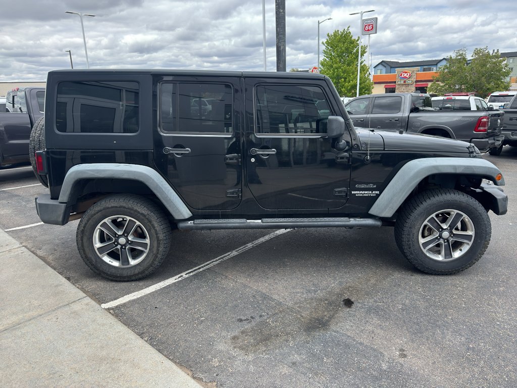 Used 2011 Black Clearcoat Jeep Sport image 6