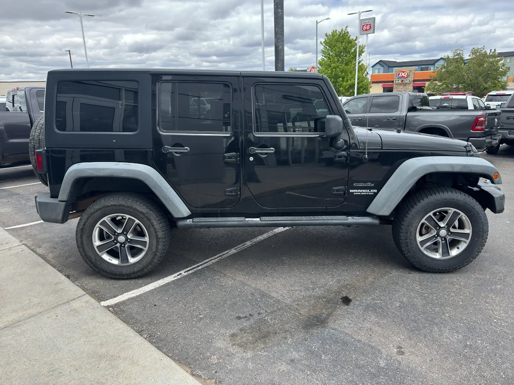 Used 2011 Black Clearcoat Jeep Sport image 6
