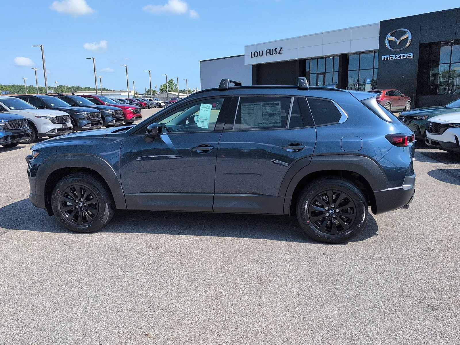 New 2026 Ingot Blue Metallic Mazda Premium image 4