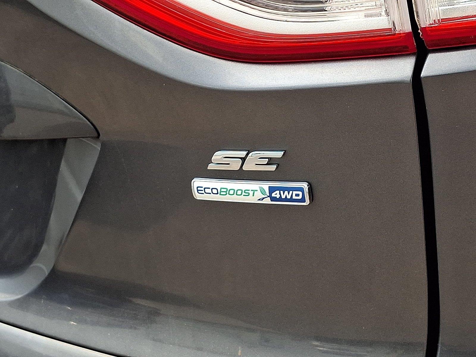 Used 2015 Magnetic Metallic Ford SE image 5