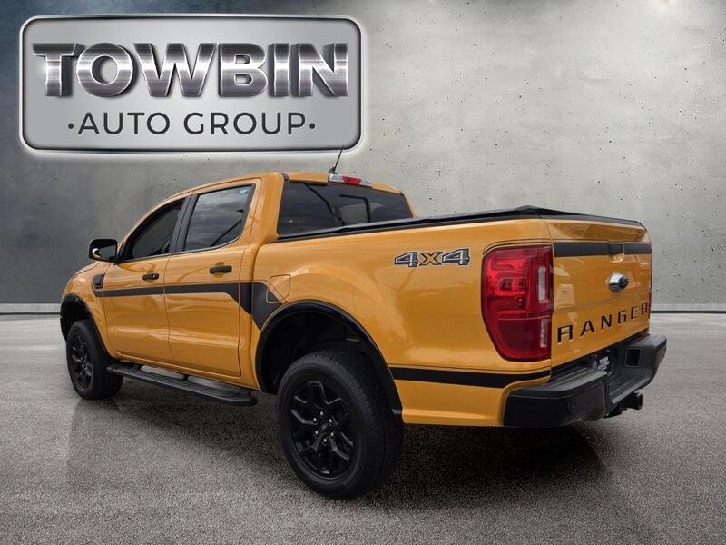 Used 2022 Orange Metallic FORD XLT 4WD SUPERCREW 5