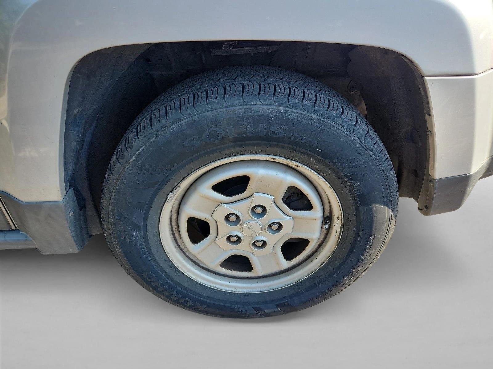 Used 2011 Bright Silver Metallic Jeep Sport image 6