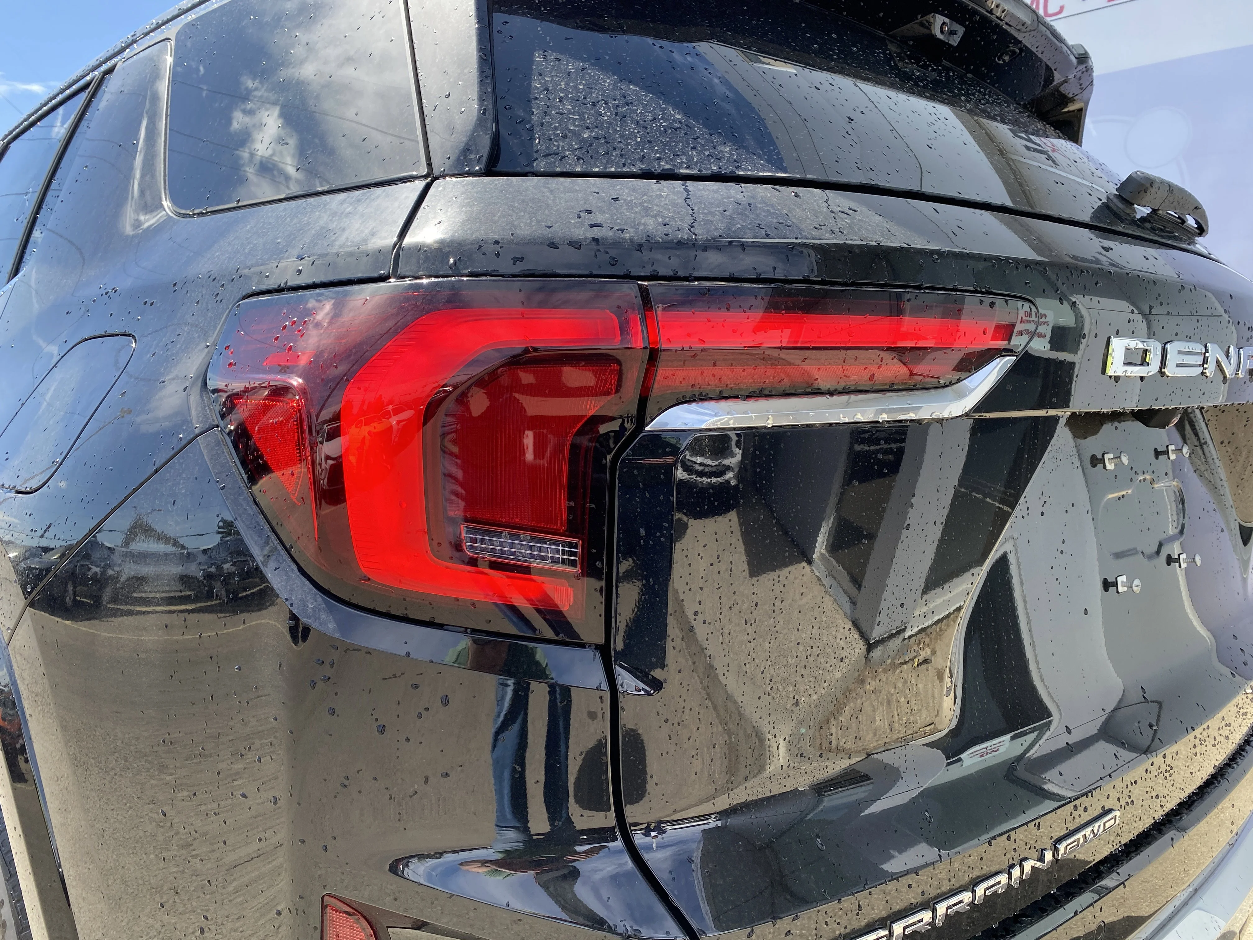 New 2026 EBONY TWILIGHT METALLIC GMC AWD Denali image 11