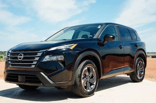 Used 2024 Super Black Nissan SV image 1