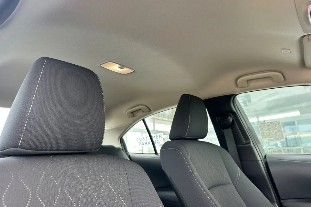 Used 2025 Midnight Black Metallic Toyota LE image 19