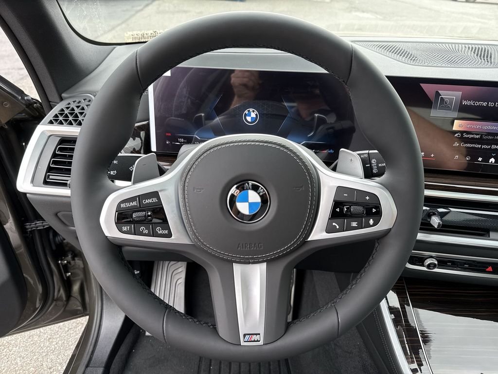 New 2026 Green Metallic BMW xDrive40i image 14