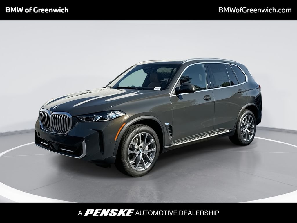 New 2026 Gray Metallic BMW xDrive40i image 1