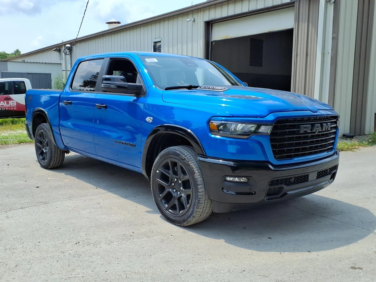 New 2026 Hydro Blue Pearl-Coat Exterior Paint RAM Laramie image 1