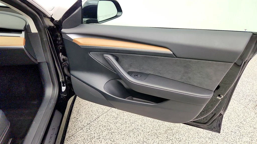 Used 2023 Solid Black Tesla RWD image 28