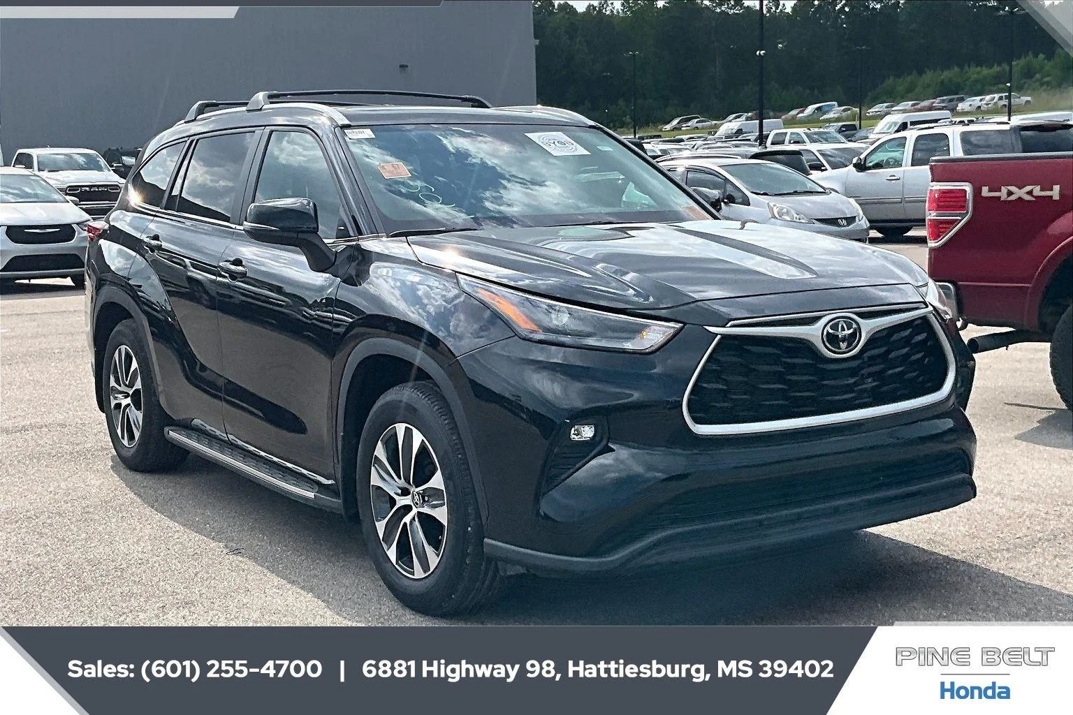 Used 2023 Midnight Black Metallic Toyota XLE image 2