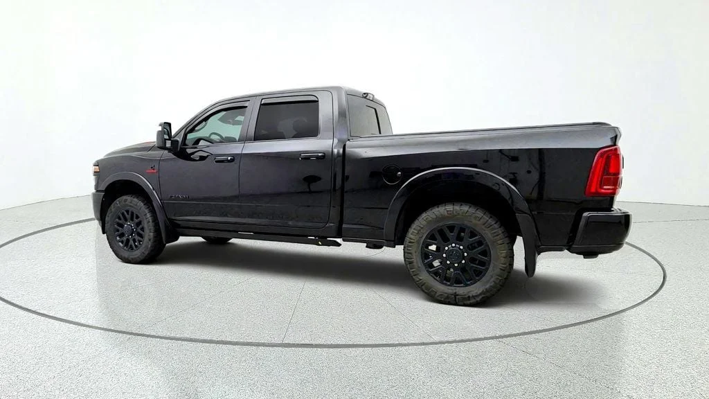 Used 2025 Black Clearcoat Ram Limited 4x4 Crew Cab 6