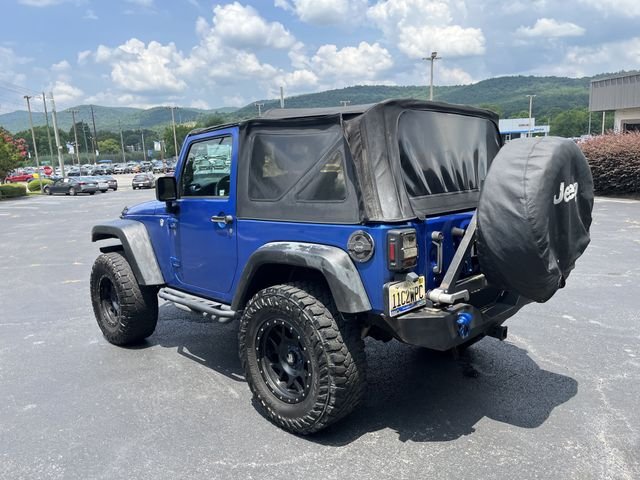 Used 2014 Flame Red Clearcoat Jeep Sport image 5