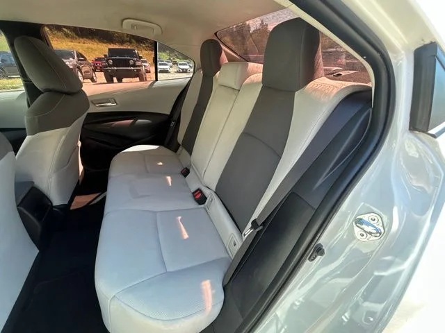 Used 2021 Super White Toyota LE image 15