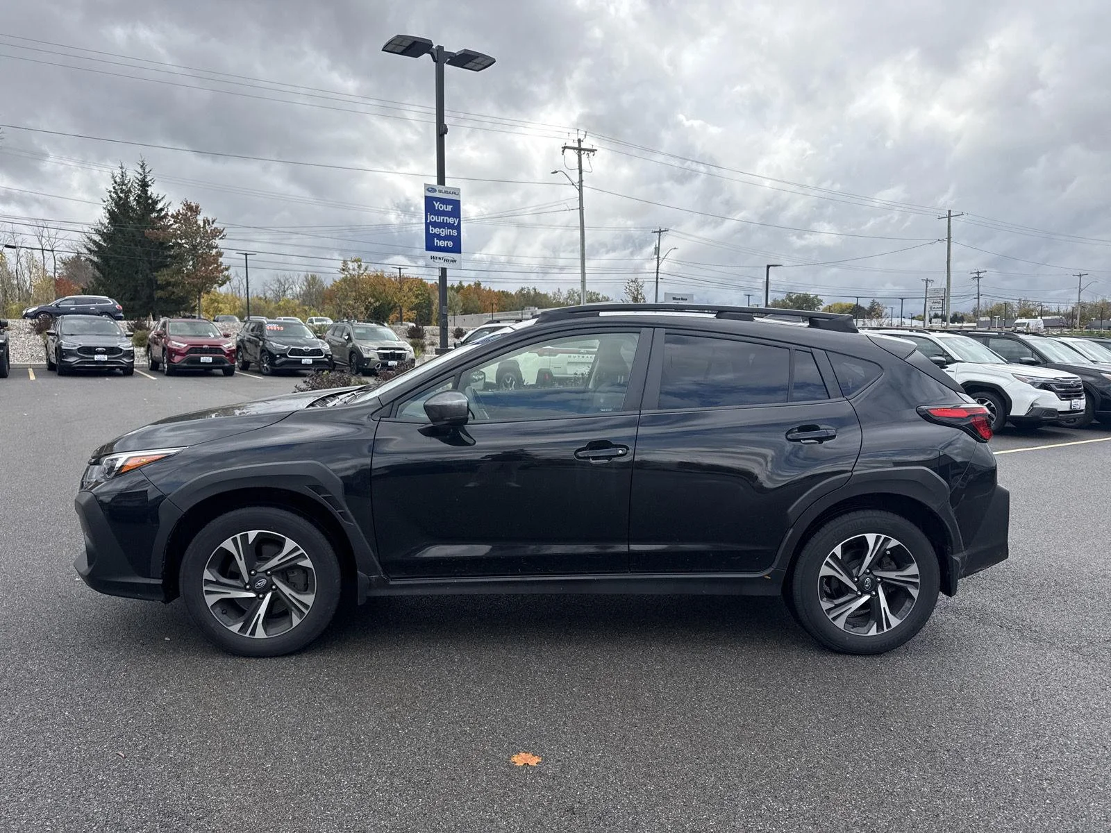Used 2024 Crystal Black Silica Subaru Premium image 5