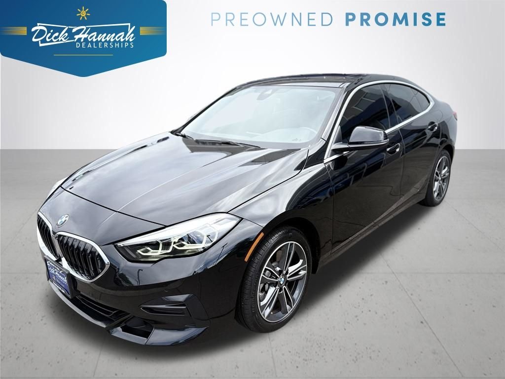 Used 2022 Black Sapphire Metallic BMW 228i xDrive image 1