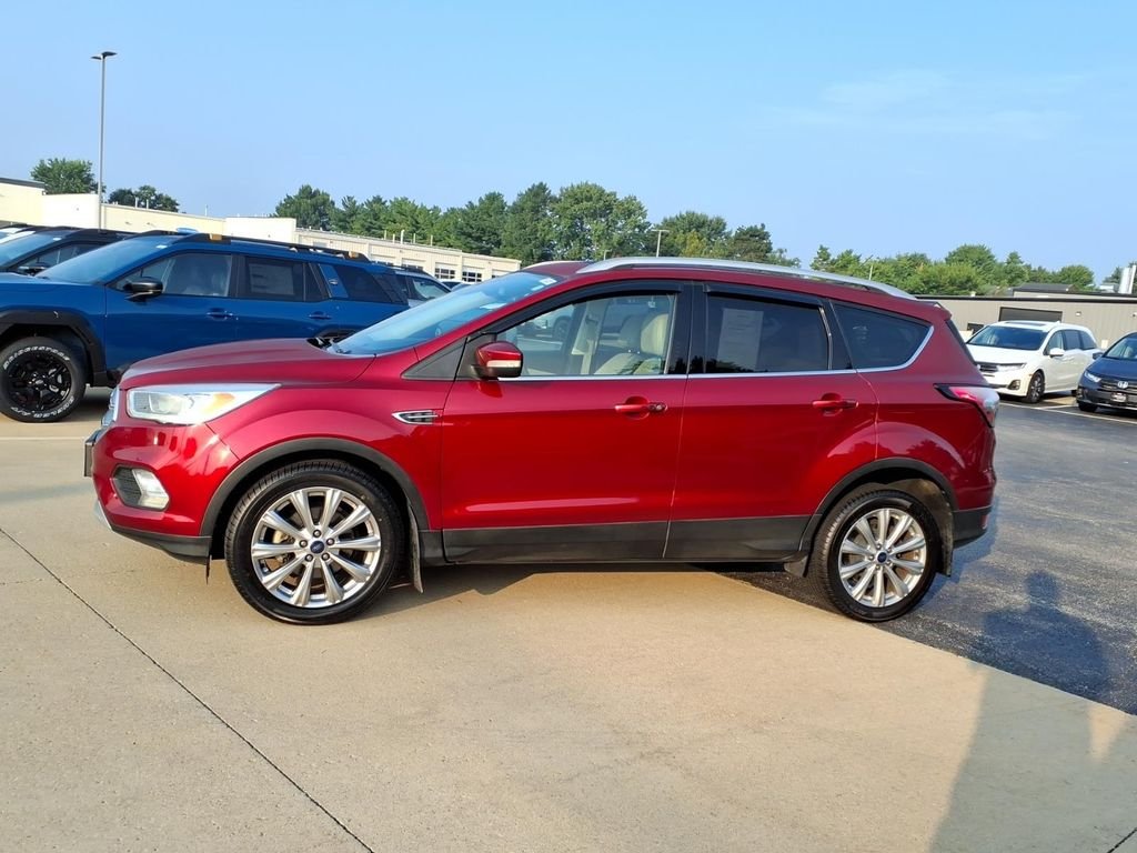 Used 2017 Ford Escape Titanium with VIN 1FMCU0JD0HUB91454 for sale in Savoy, IL