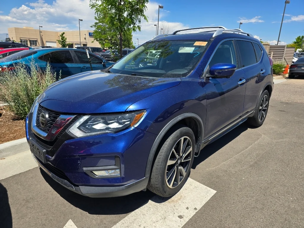Used 2018 Caspian Blue Nissan SL image 1