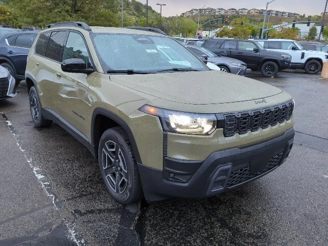 Certified Used 2026 Green Jeep Laredo image 2
