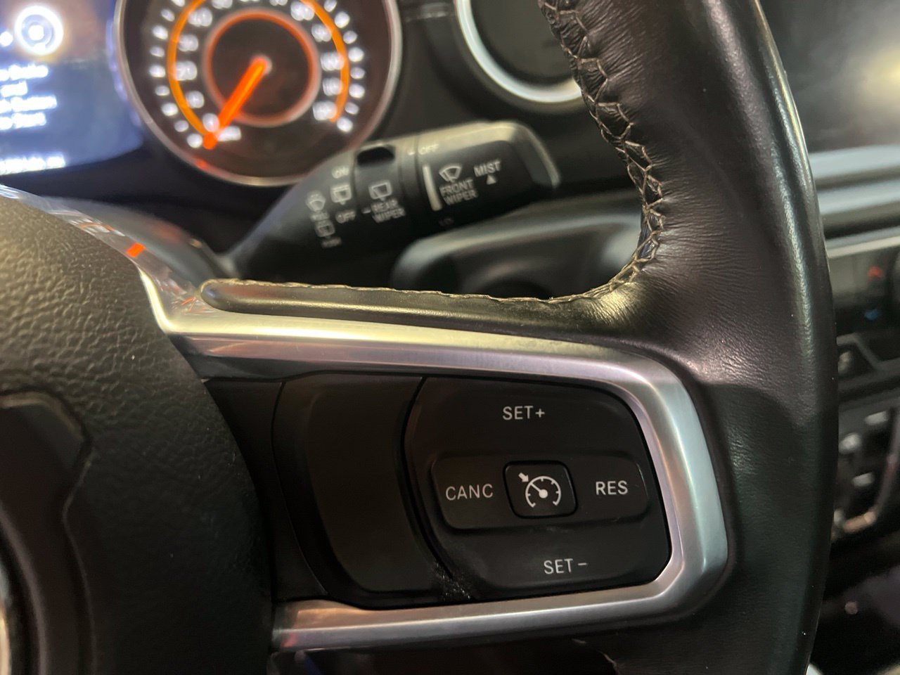 Used 2020 Orange Jeep Unlimited Sahara image 25