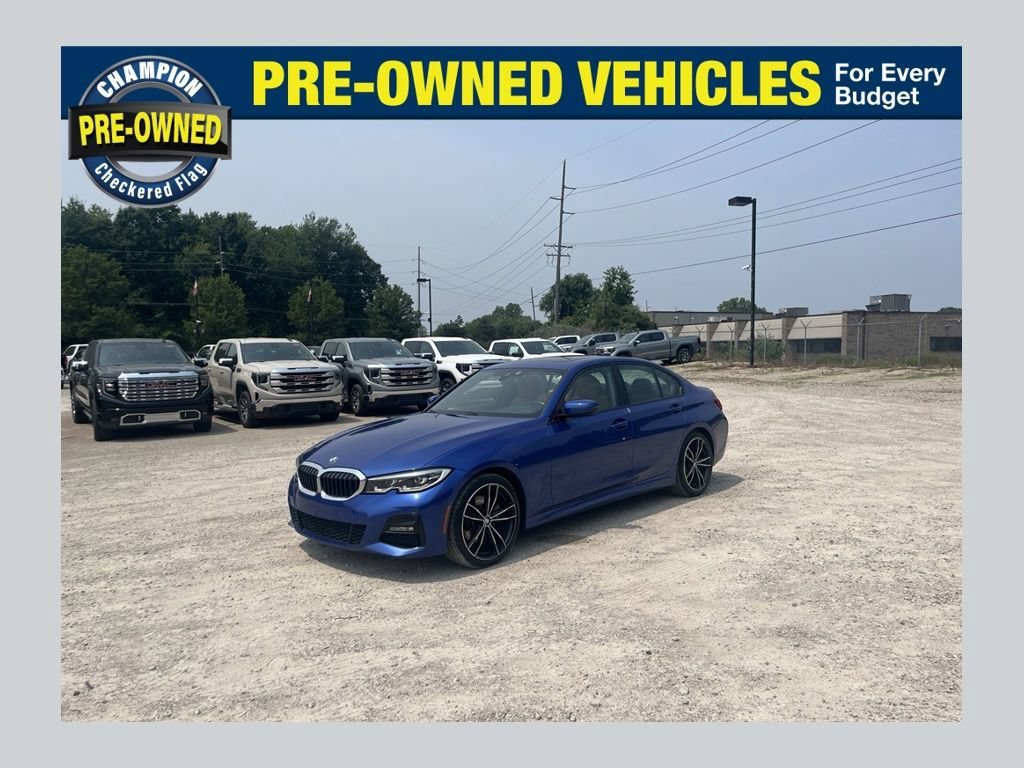 Used 2022 Portimao Blue Met BMW 330i xDrive image 1