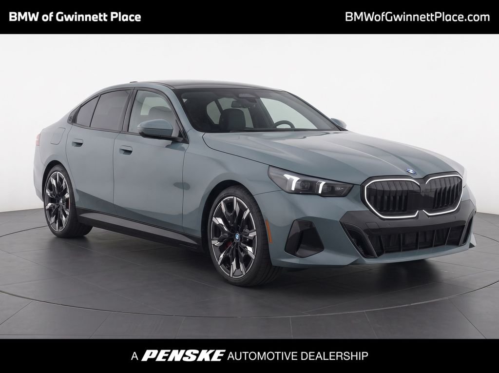 Certified Used 2024 Green Metallic BMW eDrive40 image 1