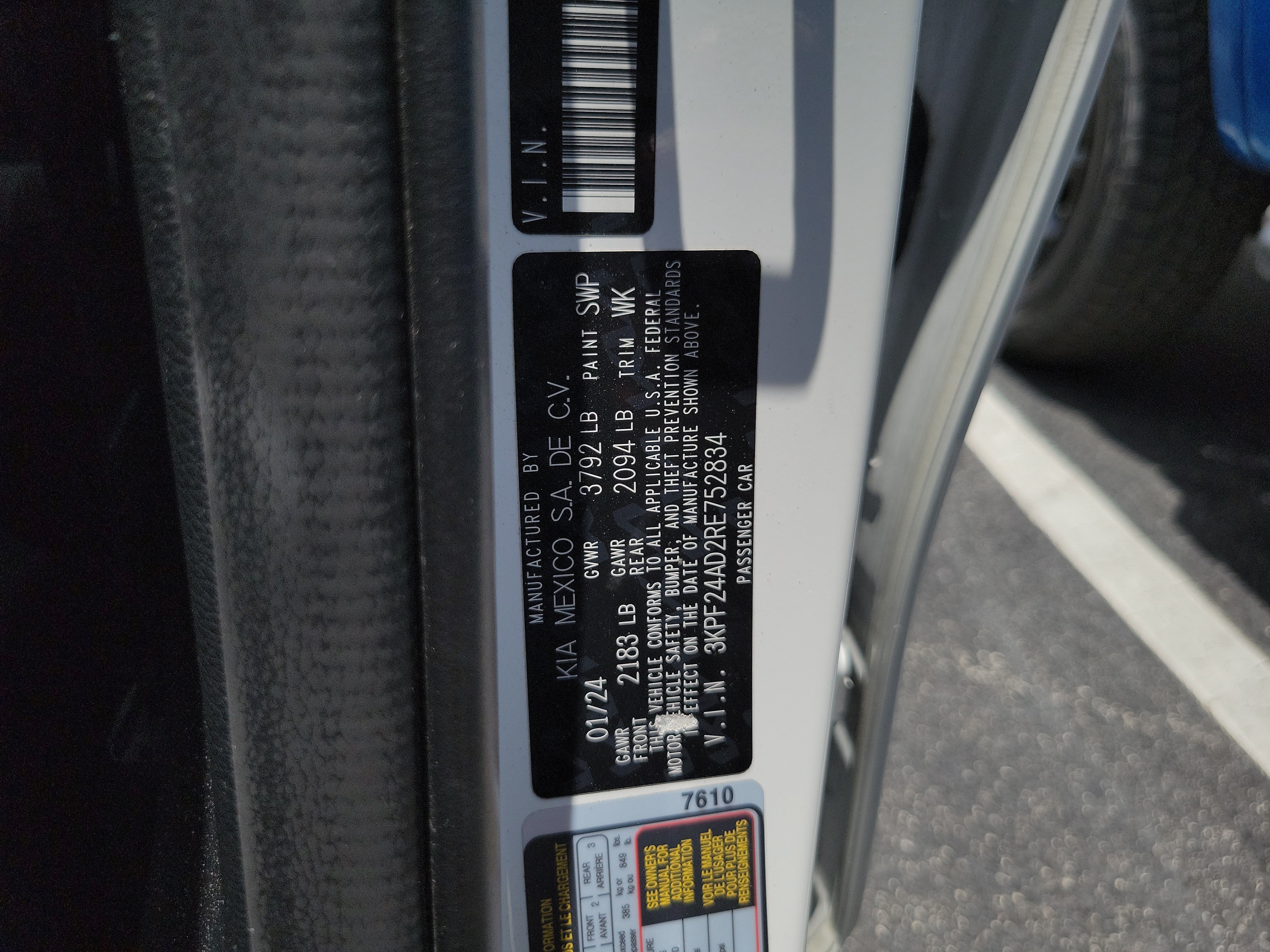 Used 2024 Snow White Pearl Kia LXS image 9