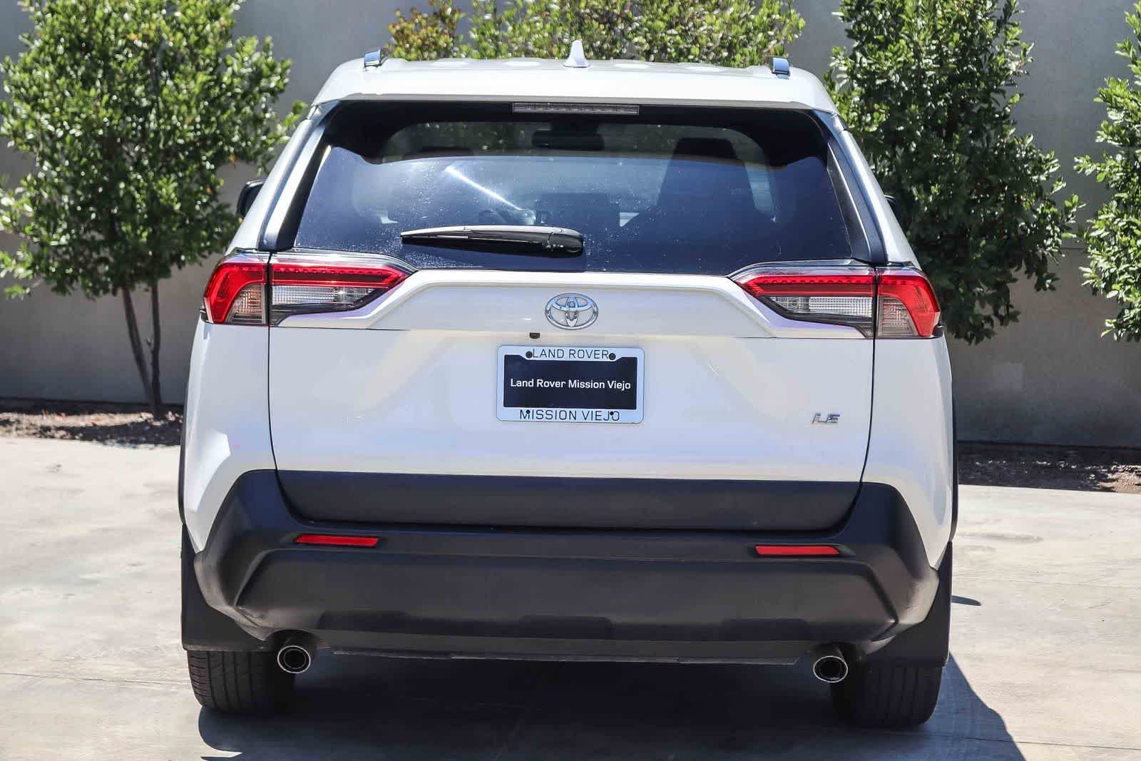 Used 2021 Super White Toyota LE image 5