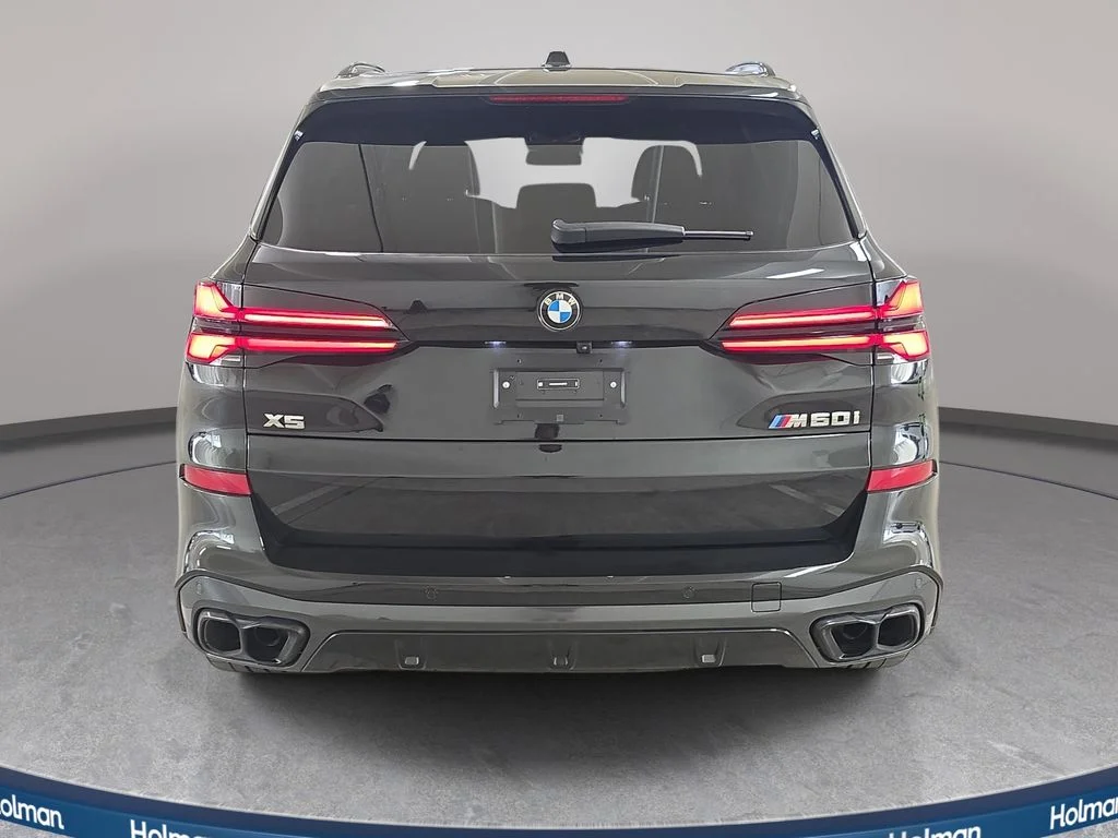 Used 2025 Black Sapphire Metallic BMW M60i image 8