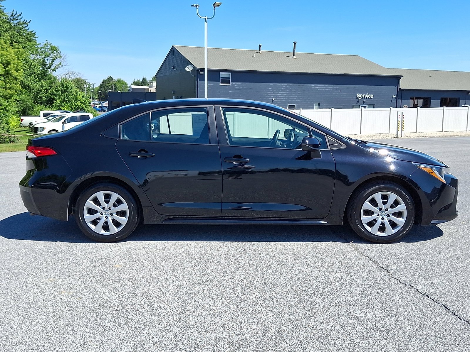 Used 2025 Midnight Black Metallic Toyota LE image 8