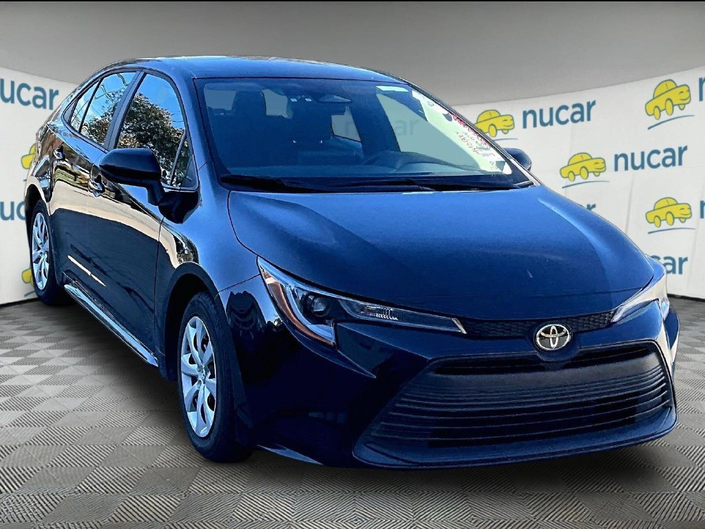 Used 2025 Black Toyota LE image 1