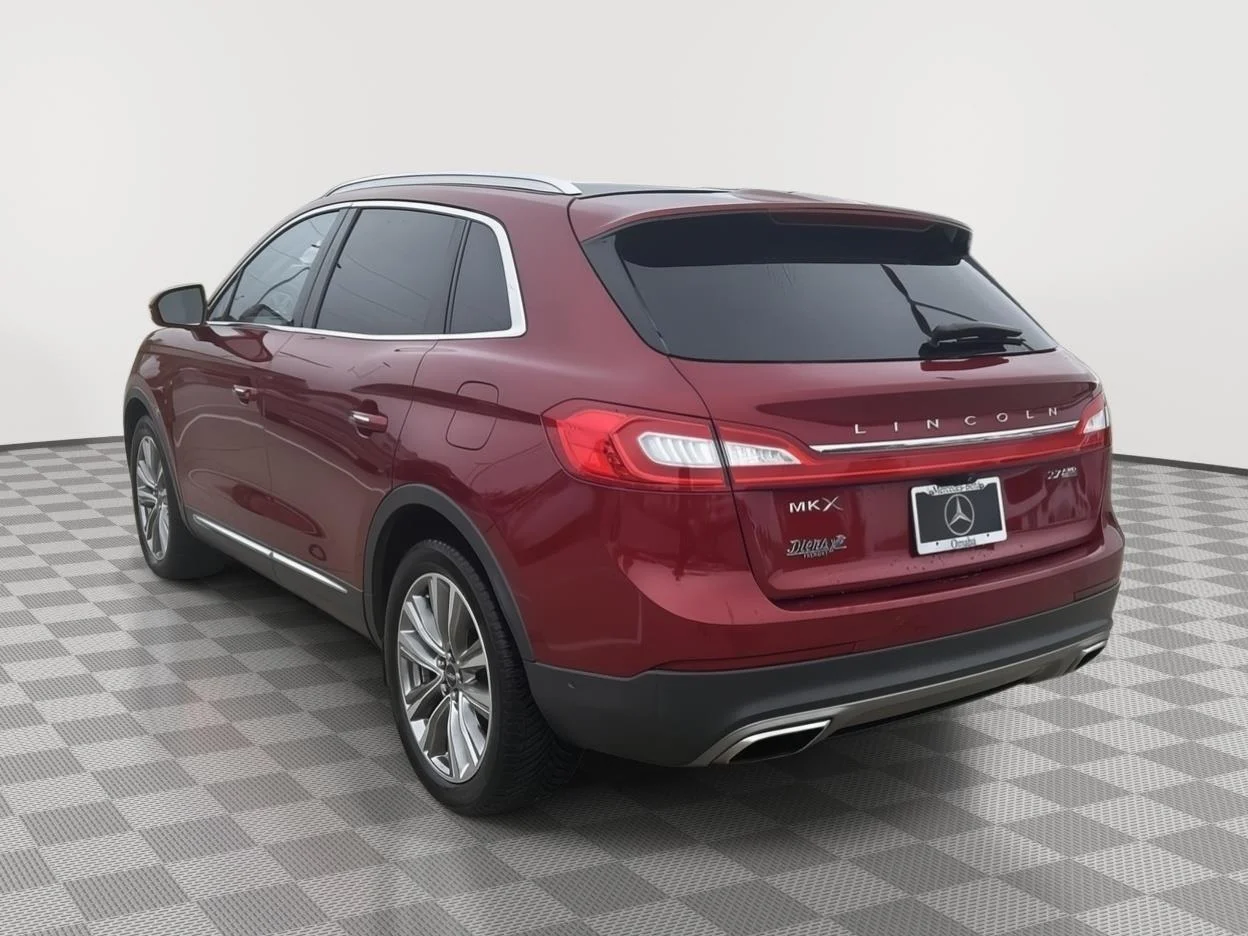 Used 2016 Ruby Red Metallic Tinted Clearcoat Lincoln Reserve image 6