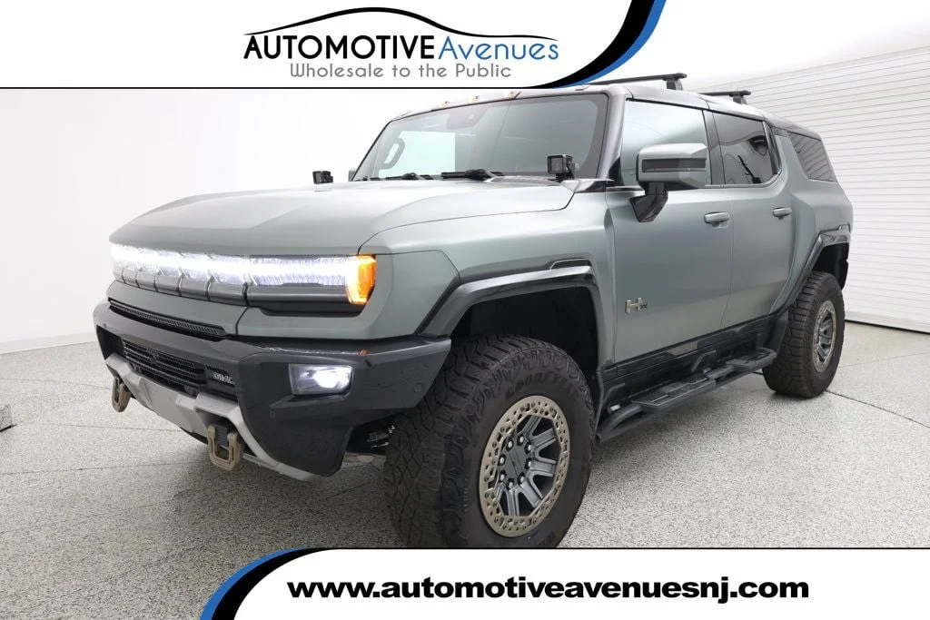Used 2024 Moonshot Green Matte GMC e4WD 4dr 3x Edition 1 w/ Extreme Off-Road & Bronze Beadlock Pkgs image 1