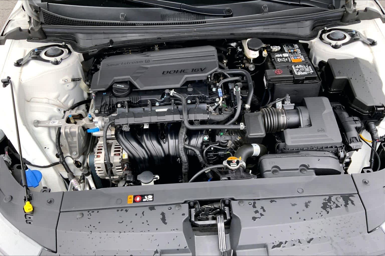 Used 2025 Snow White Pearl Kia LXS image 32