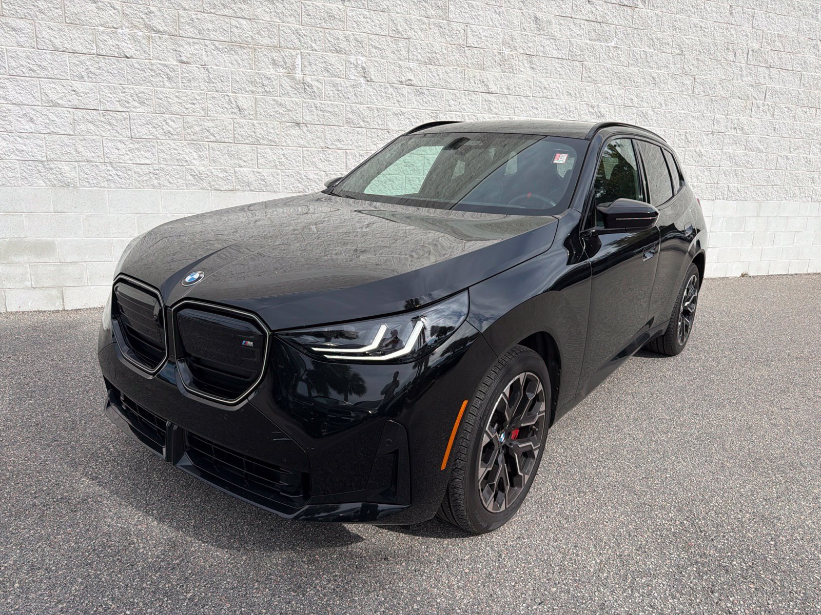 Used 2025 Black Sapphire Metallic BMW M50 xDrive image 1