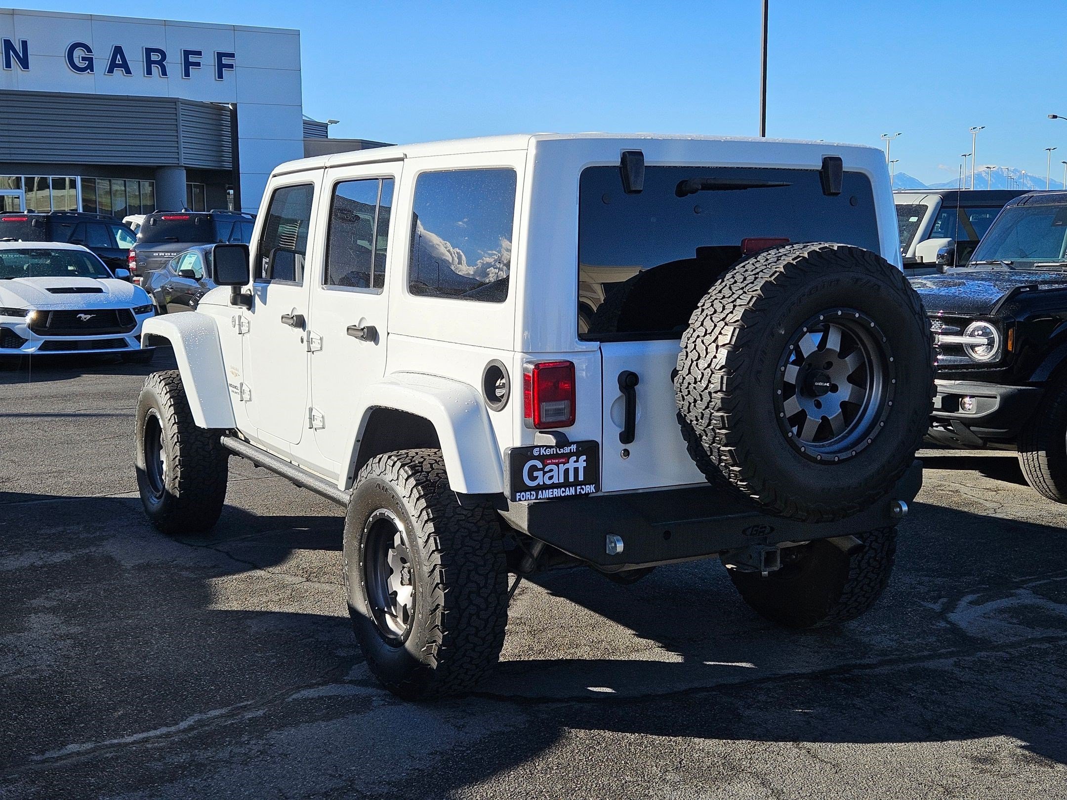 Used 2013 Bright White Clearcoat Jeep Sahara image 5