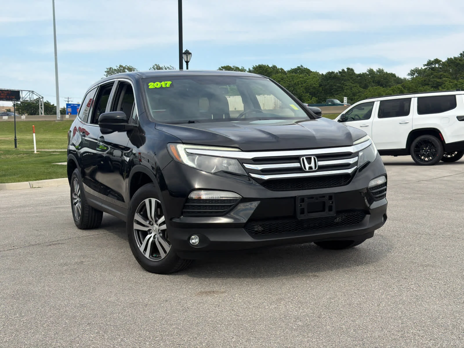 Used 2017 Honda Pilot EX-L with VIN 5FNYF6H51HB073007 for sale in Shawnee, KS