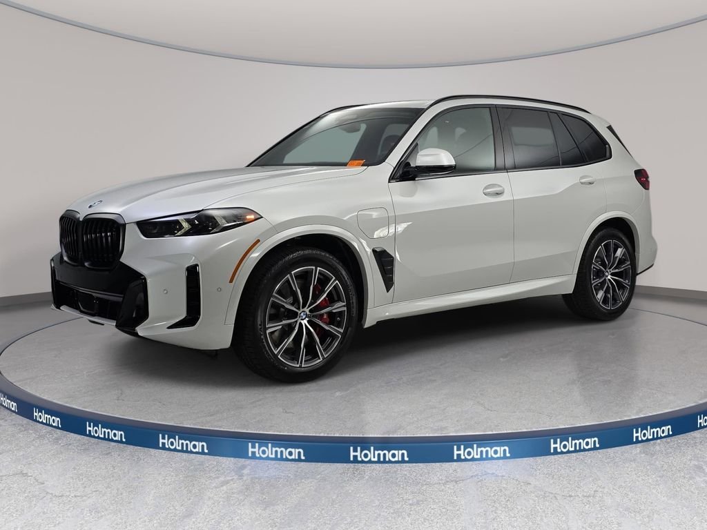 New 2026 Mineral White Metallic BMW xDrive50e image 1