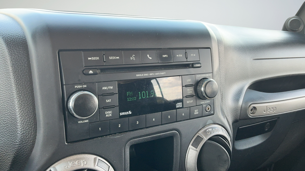 Used 2013 Black Jeep Unlimited Sport image 11