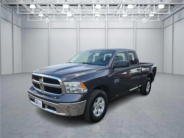 Used 2024 Gray RAM SLT 4x4 Quad Cab 6.3 ft. box 140 in. WB image 1