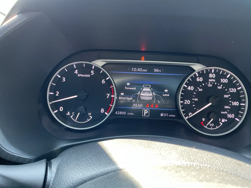 Used 2023 Electric Blue Metallic/Super Black Nissan SR image 24