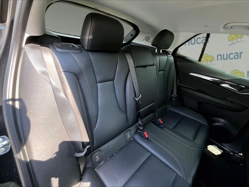 Used 2024 Ebony Twilight Metallic Buick Preferred image 16