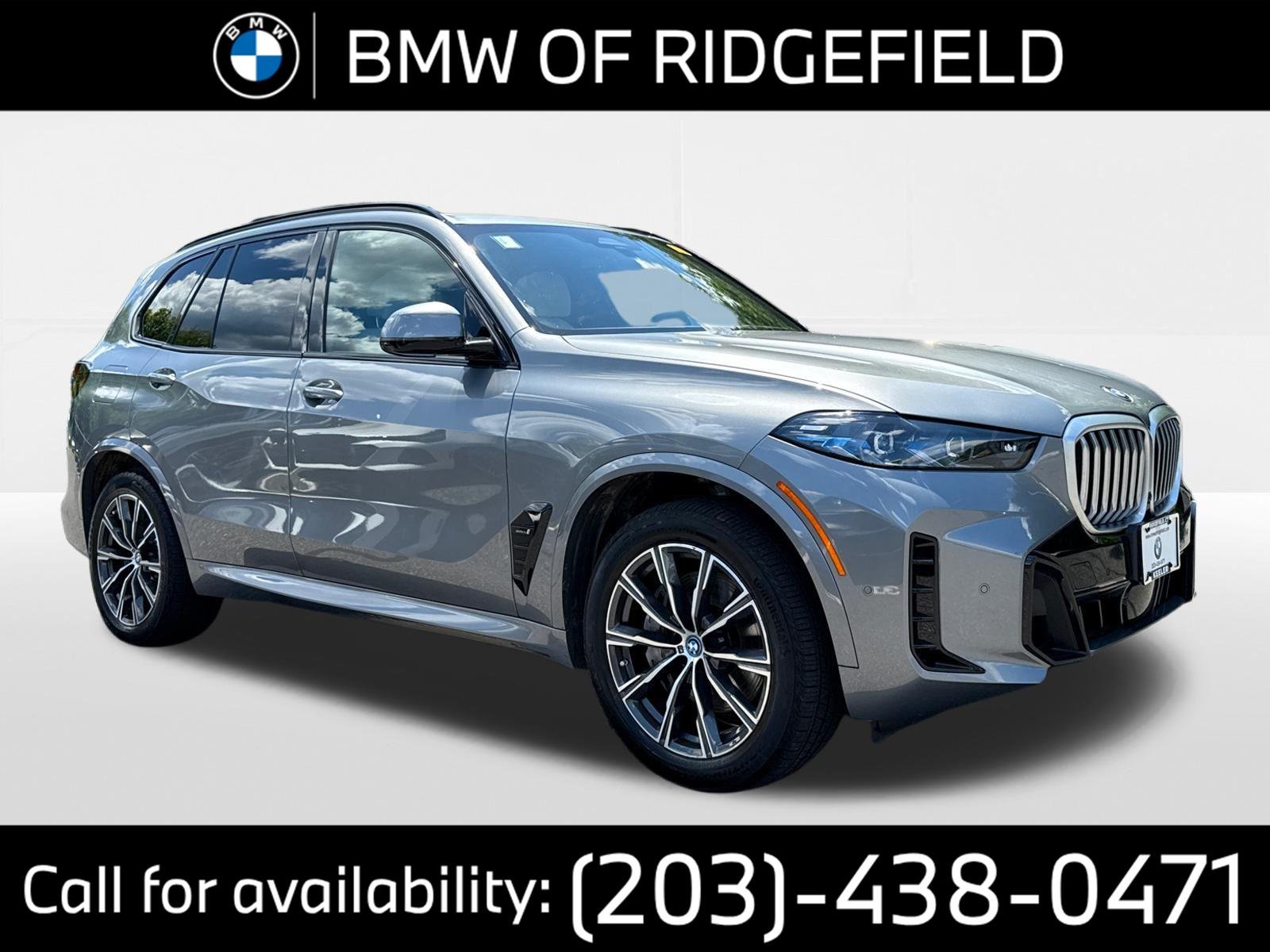Used 2024 Skyscraper Grey Metallic BMW xDrive50e image 1