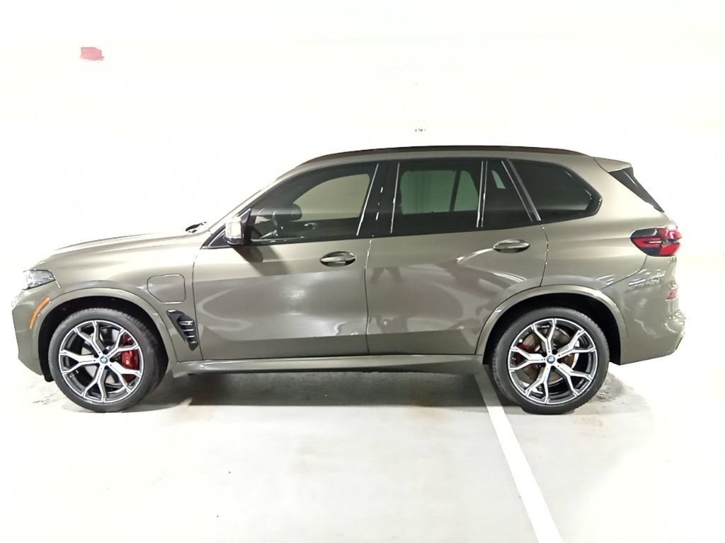Used 2024 Manhattan Green Metallic BMW xDrive50e image 8