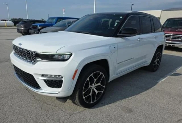 Used 2022 White Jeep Summit Reserve 4xe image 1