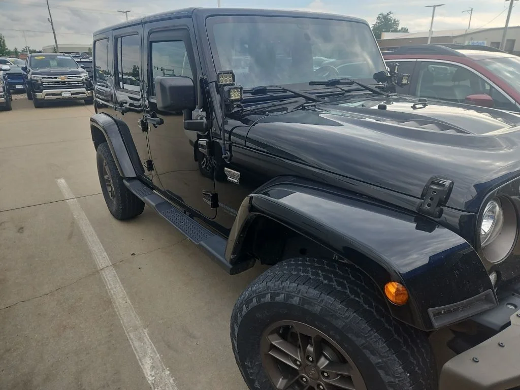 Used 2017 Black Jeep Unlimited Sahara image 4